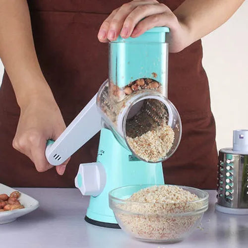 Manual kitchen mandoline slicer with round stainless steel blade in blue, green or red colours