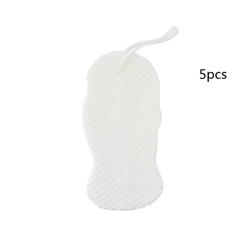 White 3D fish scale pattern bath sponge ball for gentle body exfoliation in the shower.