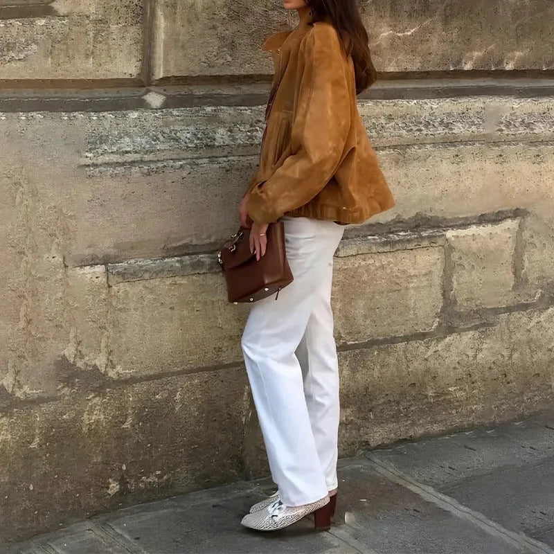 A solid colour loose-fit retro-style polyester jacket for men and women.