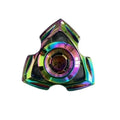 A silver alloy fingertip gyro decompression toy with a central spinning bearing.