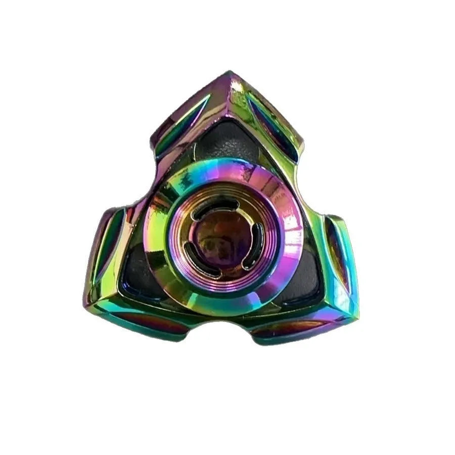 A silver alloy fingertip gyro decompression toy with a central spinning bearing.