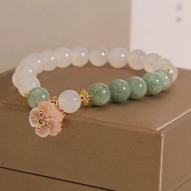 White agate and jade flower bracelet with pink accents on adjustable band