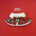 Festive red and blue printed polyester scarf for a dog around its neck during winter