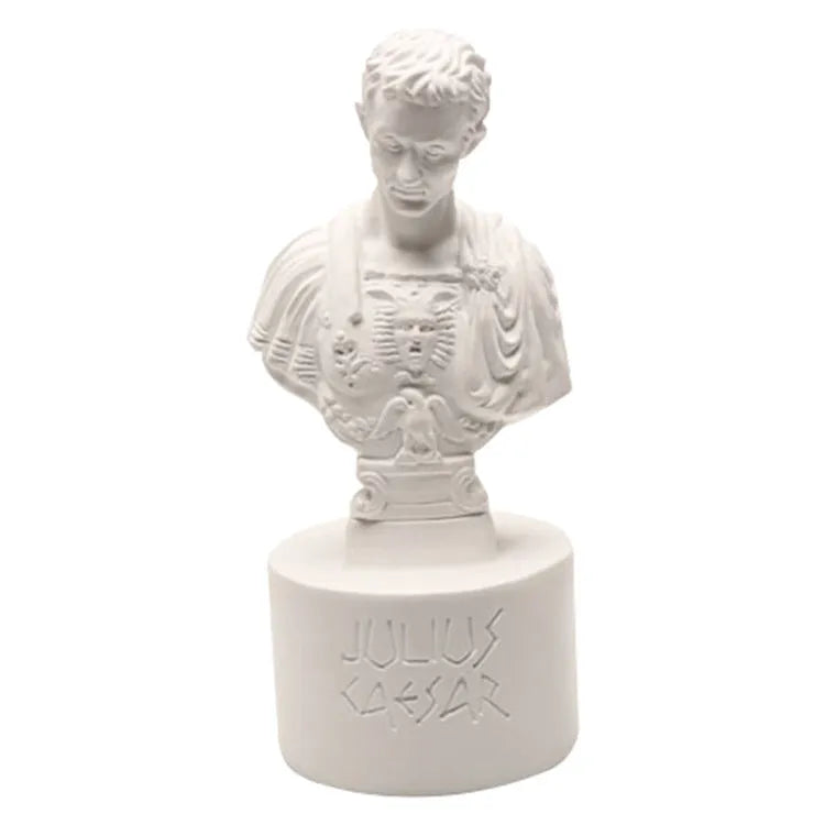 White synthetic resin American creative character modelling pen holder on a desk.