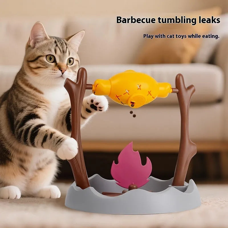 Barbecue-style tumbling cat feeder toy with food compartment, measuring 30x30x29cm.