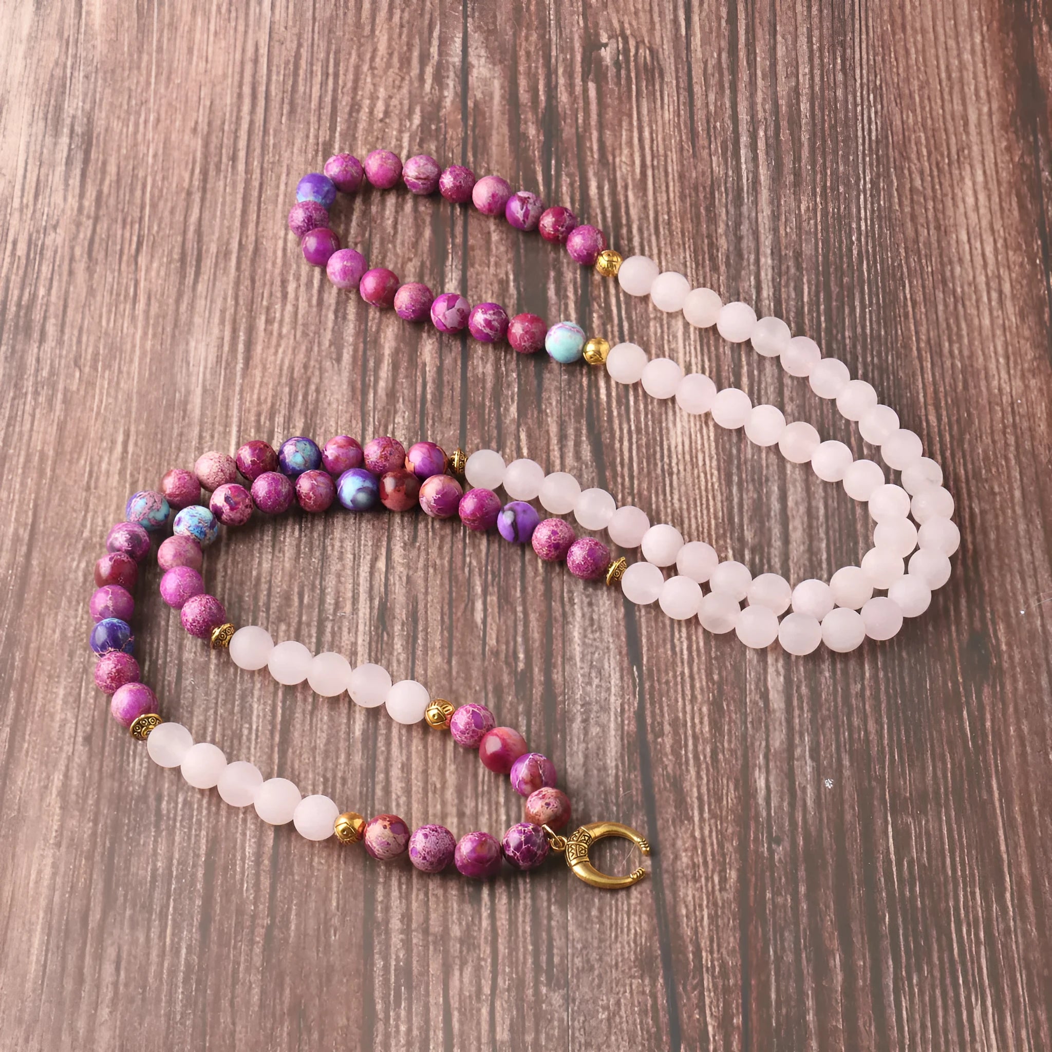 Pink crystal emperor stone round bead pendant necklace for casual unisex wear