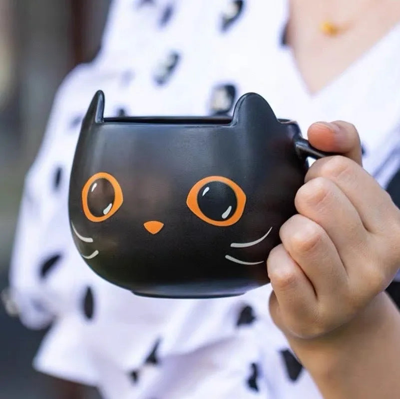 Black ceramic cat-shaped couple mug with pumpkin cover and 355ml capacity.