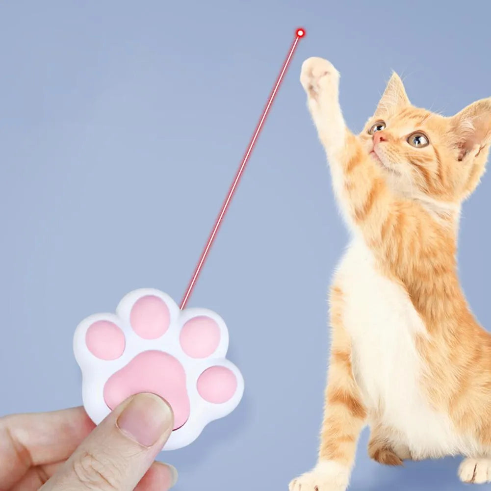 Pink and black infrared cat teaser toy with key chain measuring 5cm by 2.5cm