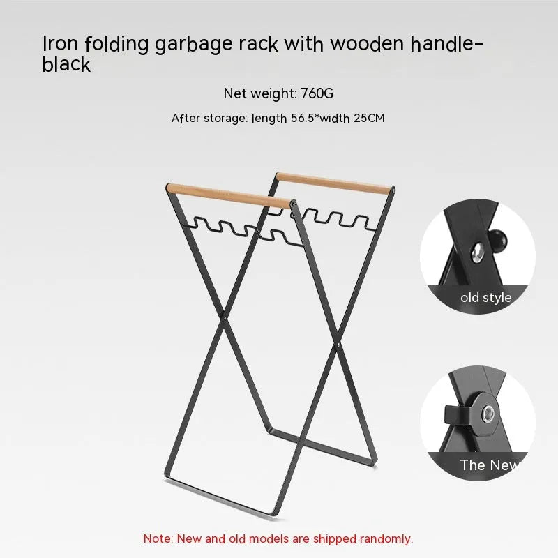 Outdoor black wrought iron garbage storage hanger with wooden handle holding bin bag