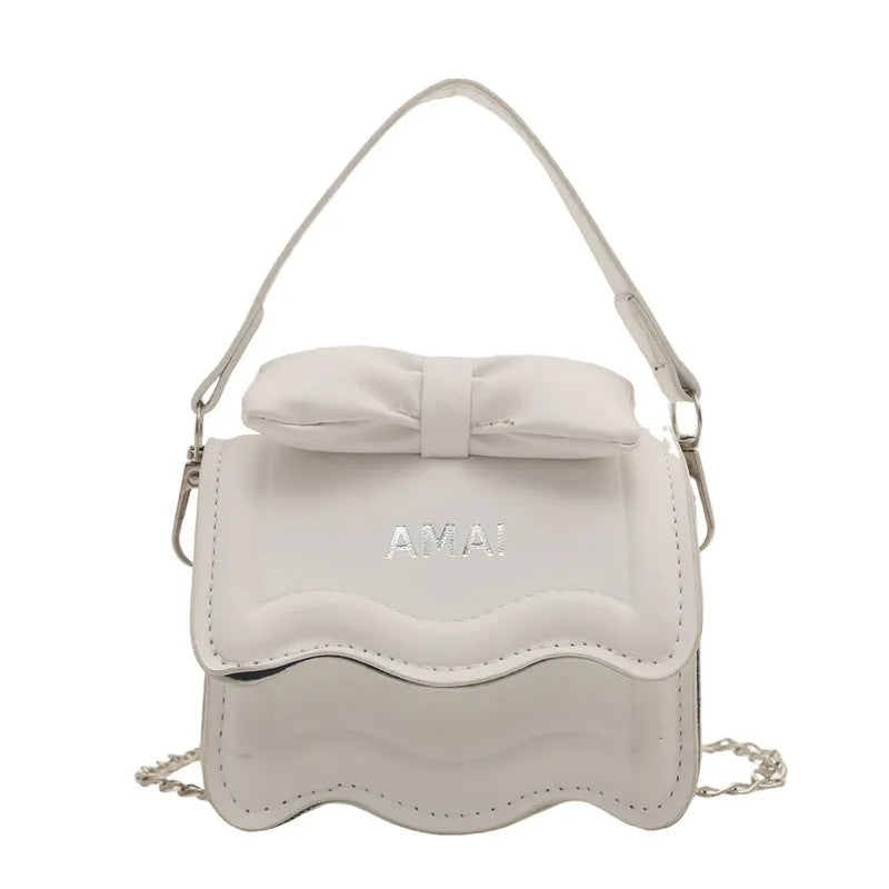Small black PU leather crossbody bag for women with a single shoulder strap