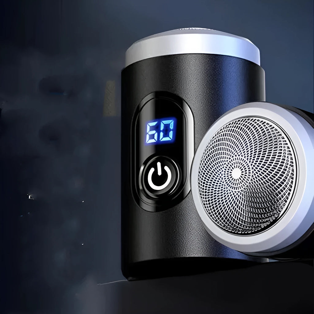 Black USB rechargeable mini shaver with cleaning brush and cable on a white background.