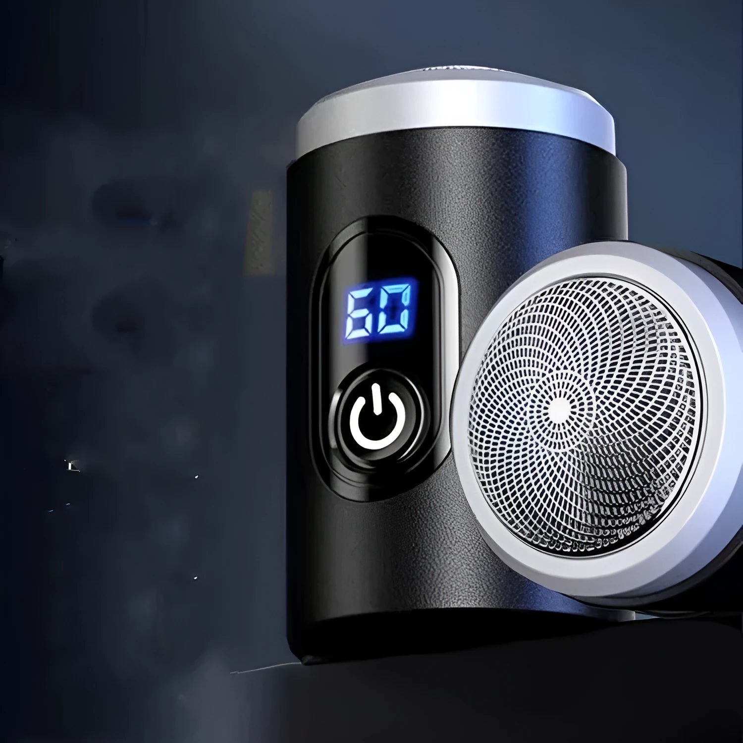 Black USB rechargeable mini shaver with cleaning brush and cable on a white background.