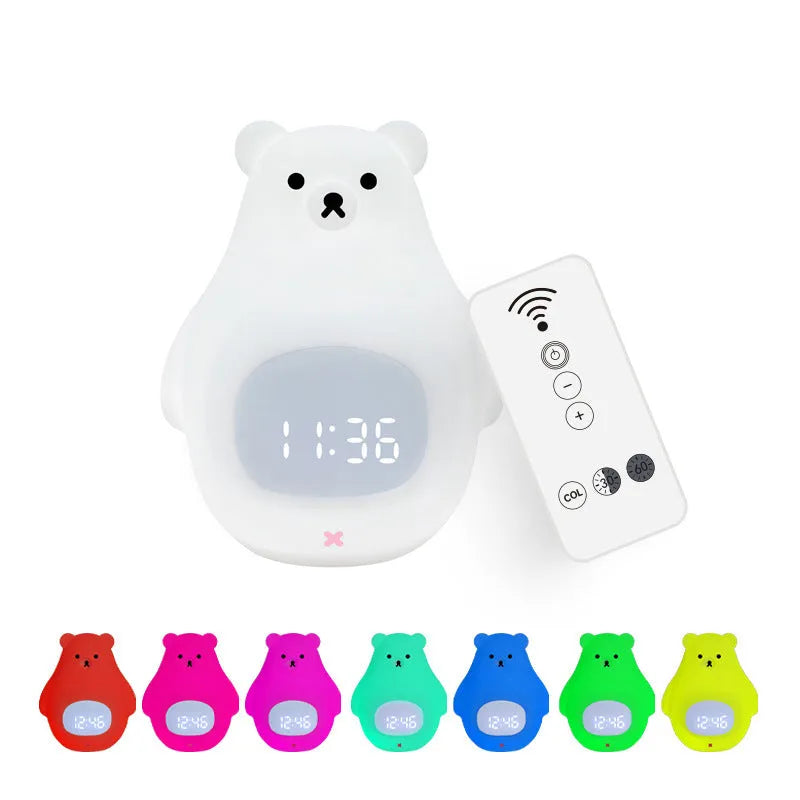 White cartoon bear silicone night light with remote control on a surface.