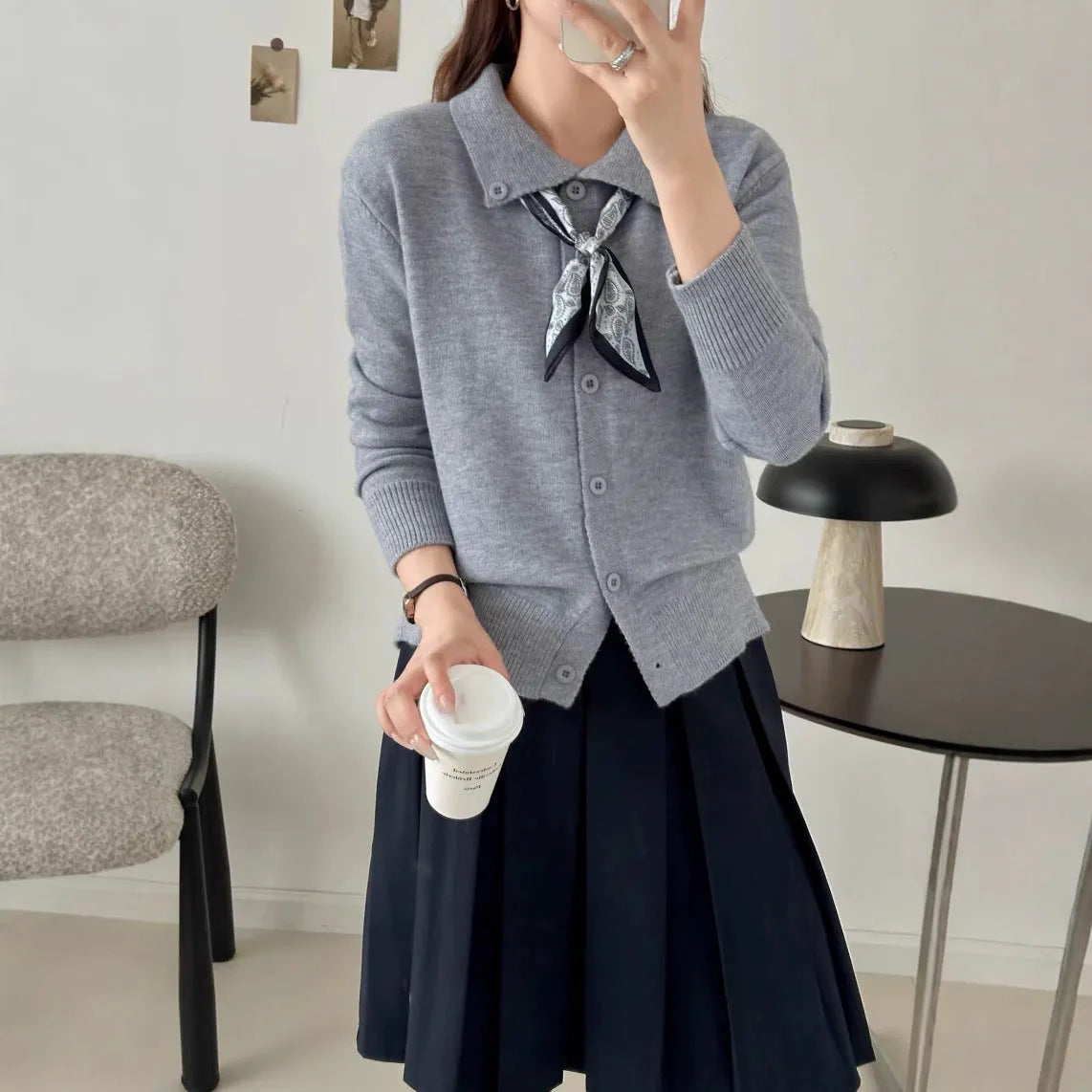 Women's beige lapel scarf cardigan sweater with long sleeves on hanger
