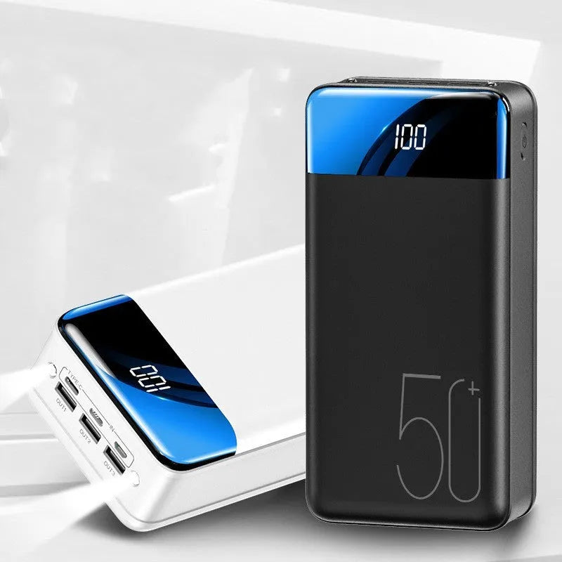 Large black or white 50000mAh power bank showing multiple USB ports on front.