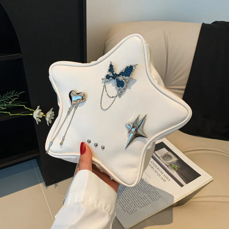 Black PU leather street style backpack with a detachable star-shaped butterfly pendant and chain strap.