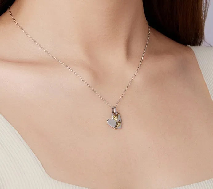 Original Hug Love 925 sterling silver heart necklace with adjustable O-ring chain on white background