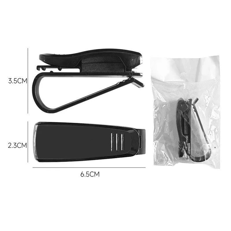 Black plastic car sun visor clip for holding sunglasses, tickets and ID cards.