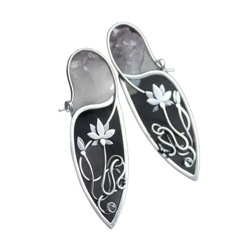 Silver lotus flower vine earrings with geometric rhinestone accents and retro styling