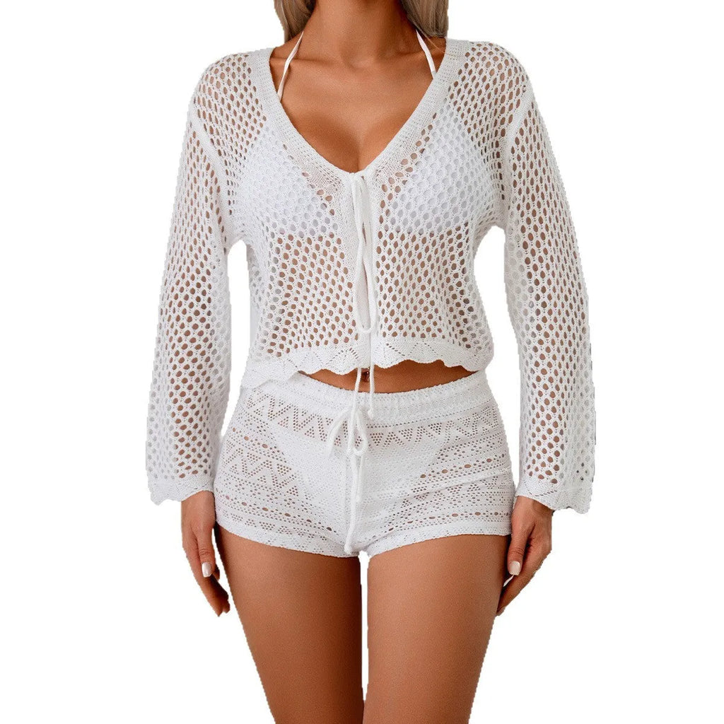 Short apricot coloured women's cardigan blouse with hollow weave texture and flared bell sleeves.