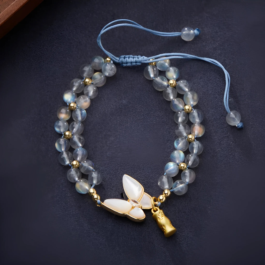 Handwoven women's bracelet with grey moonstone butterfly centrepiece on geometric design