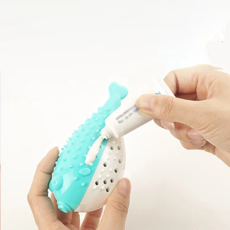 Mint Toys blue silicone fish-shaped cat chew toy with catnip on a white background