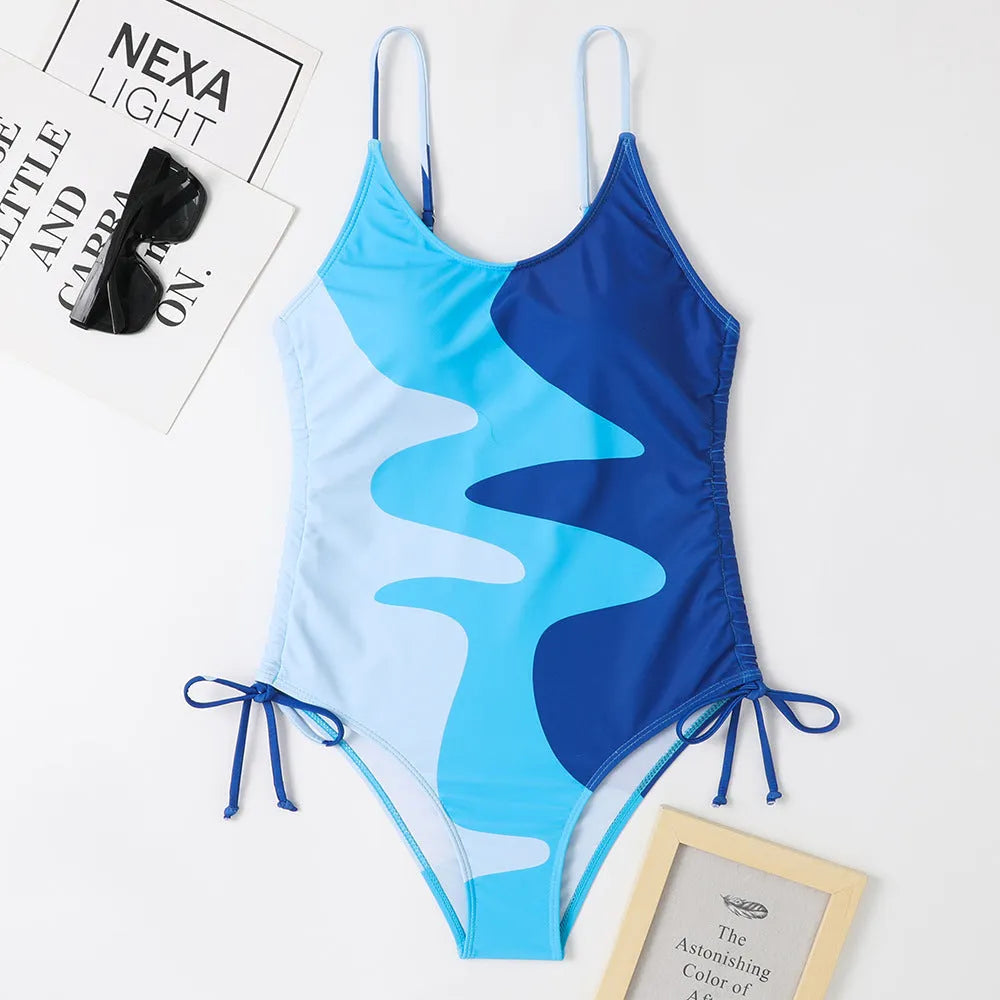 Women's sleeveless one-piece swimsuit in printed design with multiple colour options