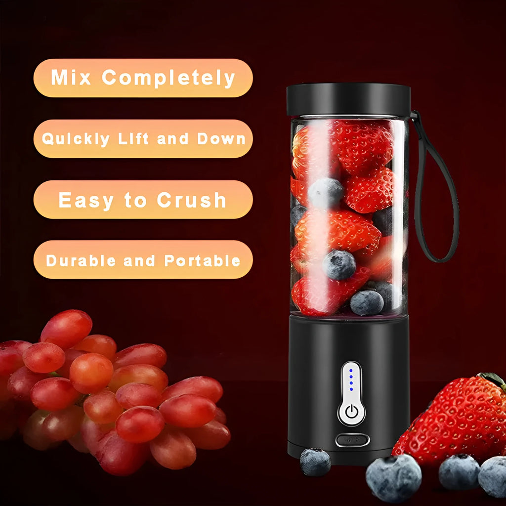 Black portable hand blender with transparent 530ml measuring cup and five-blade cutter head.