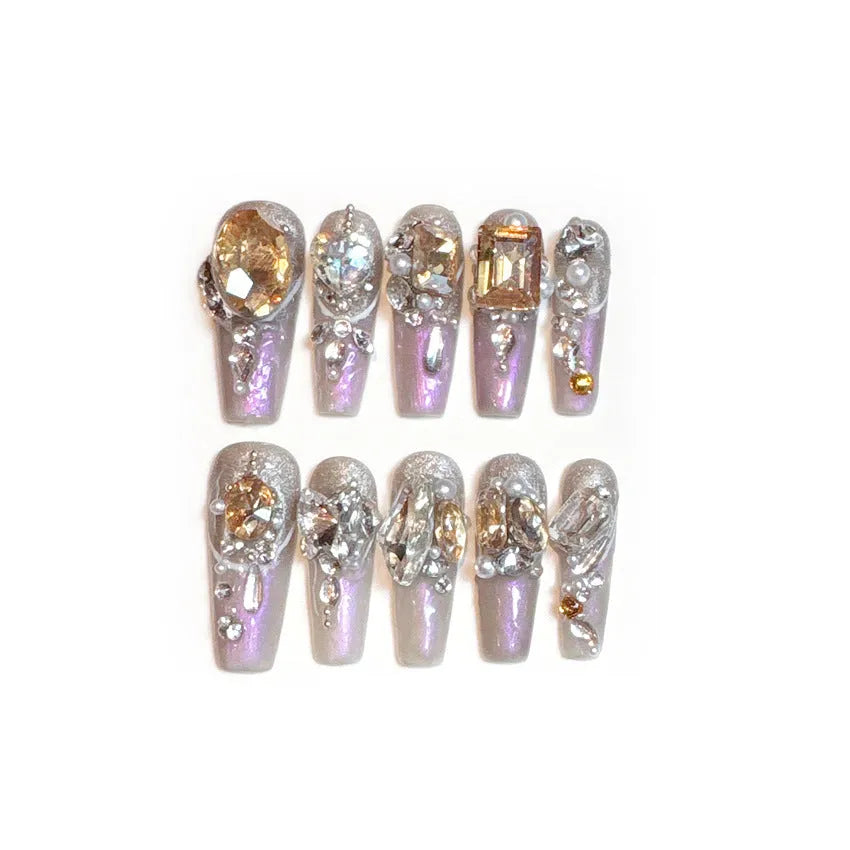 False nail patches with luxury rhinestone designs and phototherapy sealing layer in card packaging
