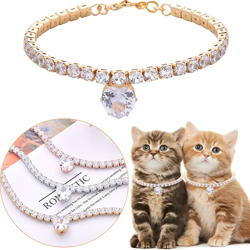 Gold rhinestone heart-shaped decorative collar for cat or dog on a white background.