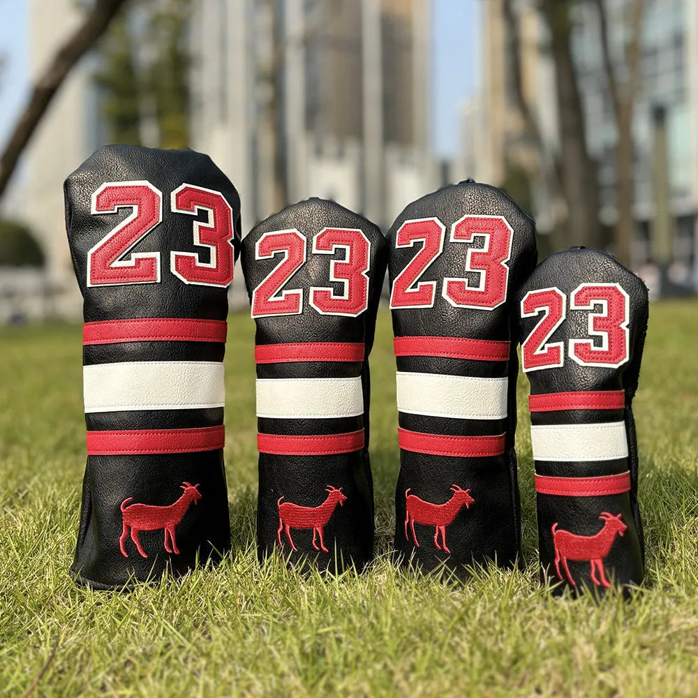 Set of coloured chicken drumstick design golf club head covers for fairway woods, a square putter, and irons.