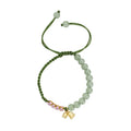 Red rope hand woven women's bracelet with floral design in Lily carrying strap colour