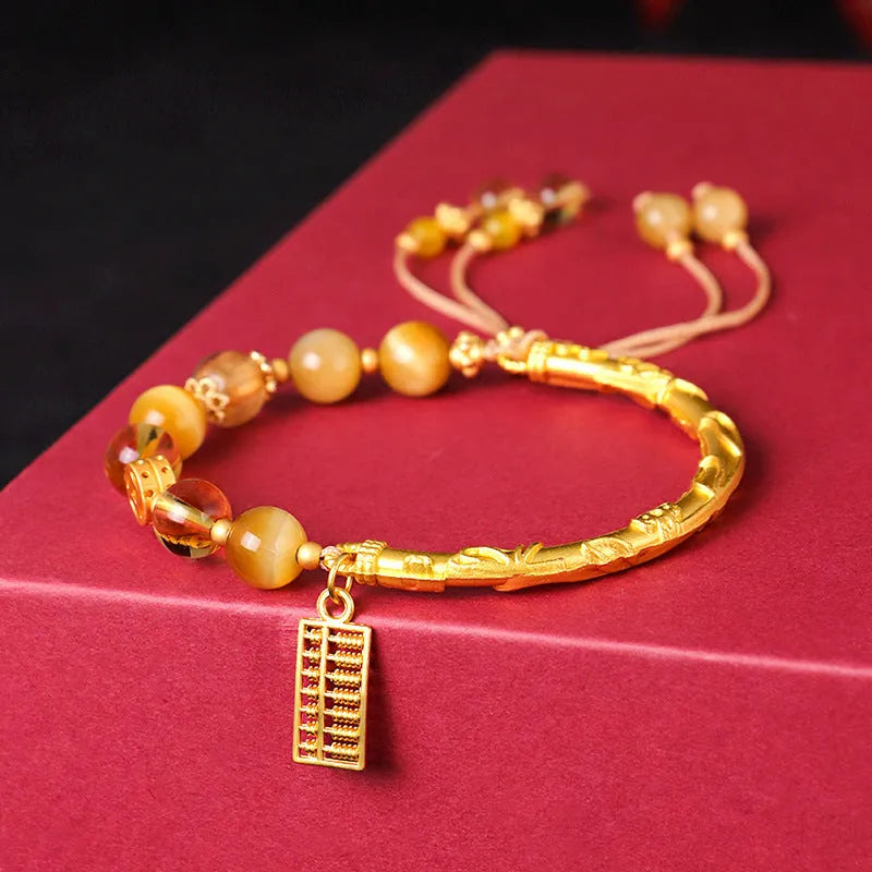 Women's abacus tag bracelet with tigereye and citrine gemstone beads and copper diamond charm