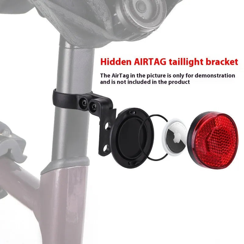 Red plastic bicycle taillight bracket mounted on seat post with reflective elements
