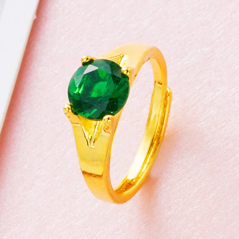 Adjustable copper ring with placer gold zircon accents shown in six colour options