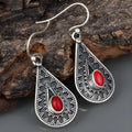 Silver drop-shaped retro earrings with water drop pendant design in European national style