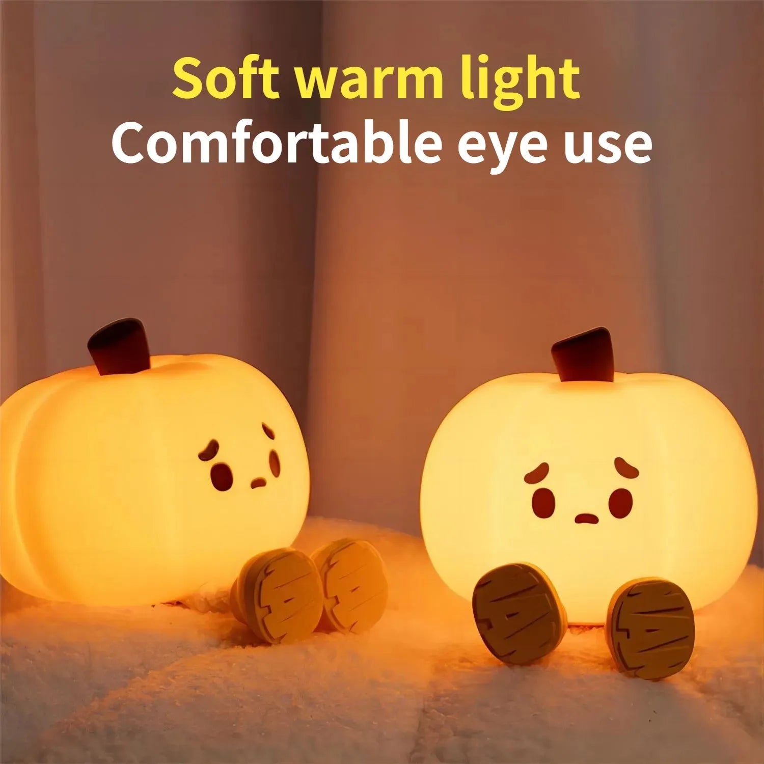 Soft silicone pumpkin-shaped night light with warm yellow glow