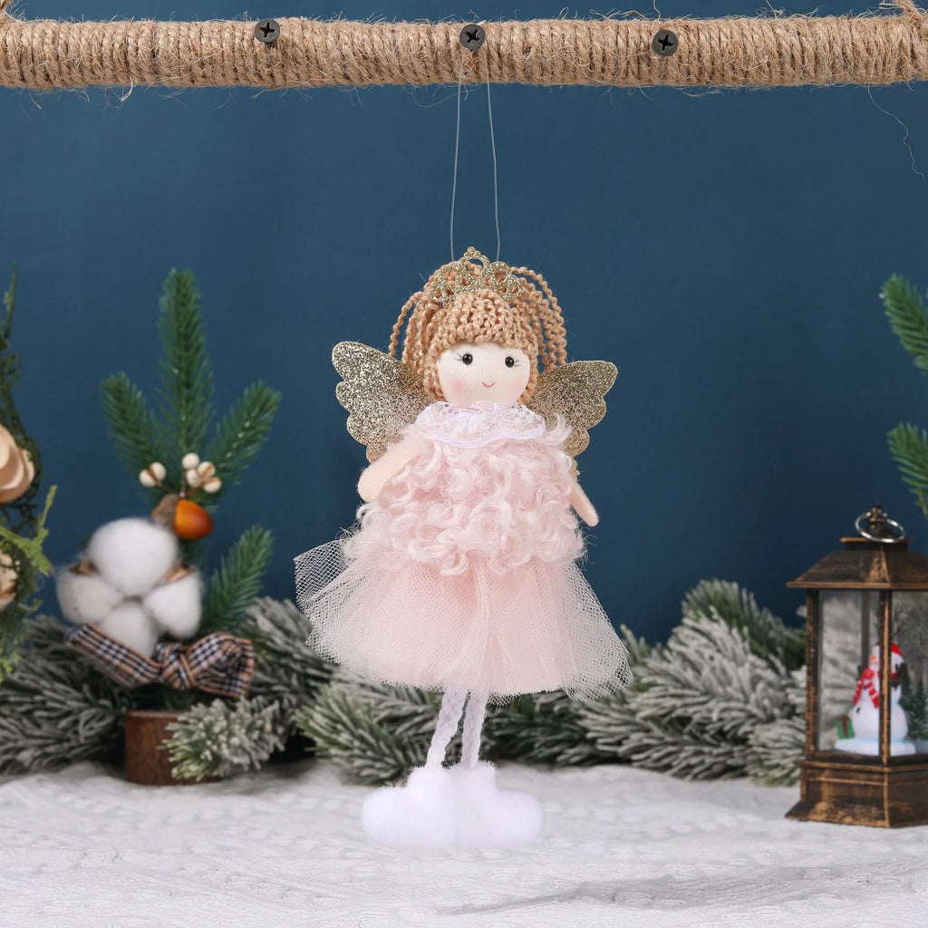 Cartoon angel cloth hair clip for a girl's Christmas ponytail in khaki, pink, or white.