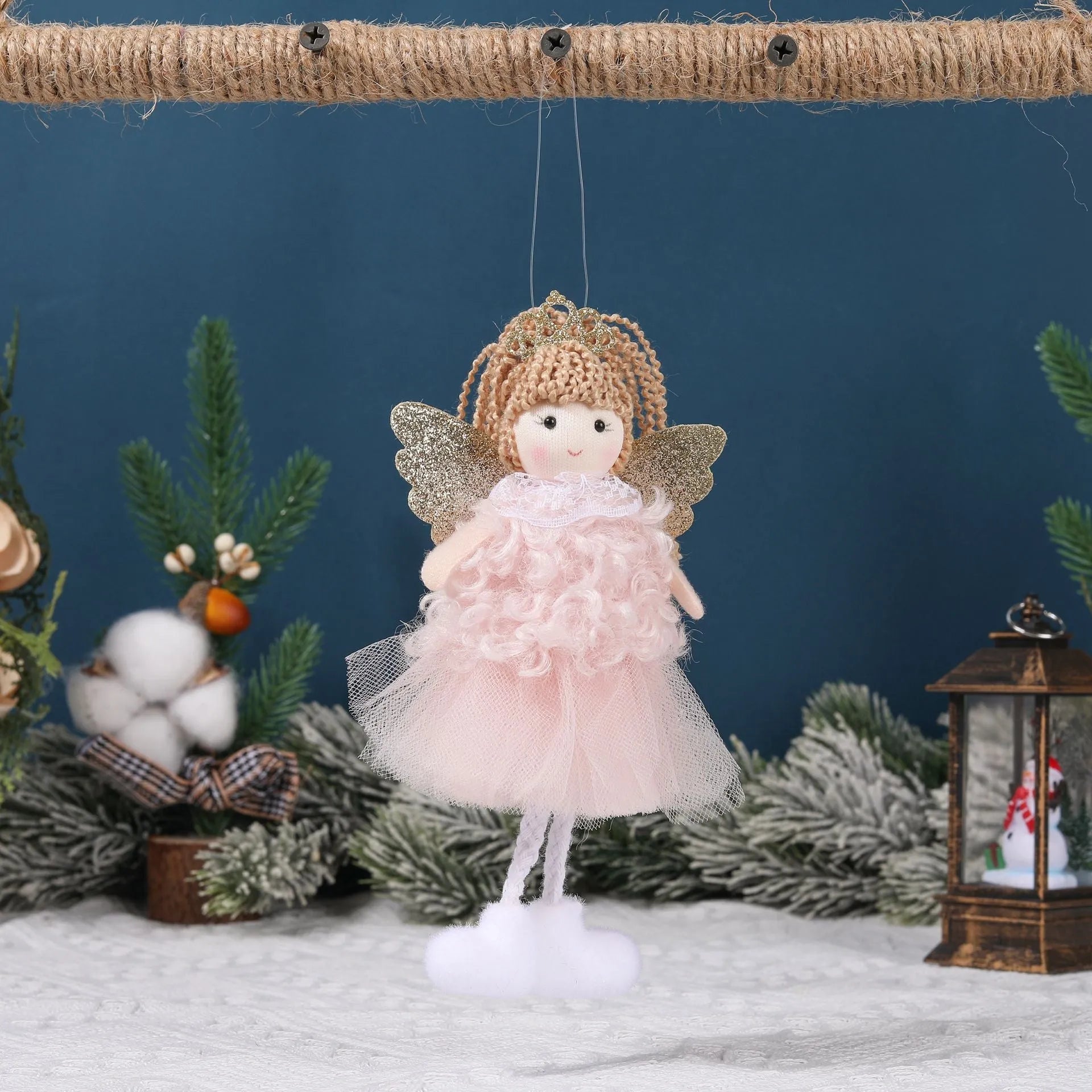 Cartoon angel cloth hair clip for a girl's Christmas ponytail in khaki, pink, or white.