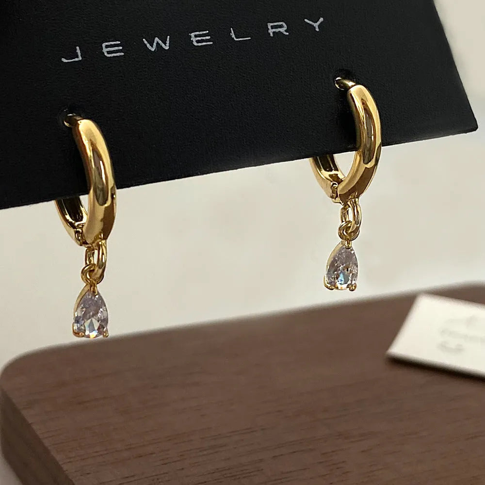 Zircon jewellery set showing necklace, earrings and anklet with geometric Korean-style design