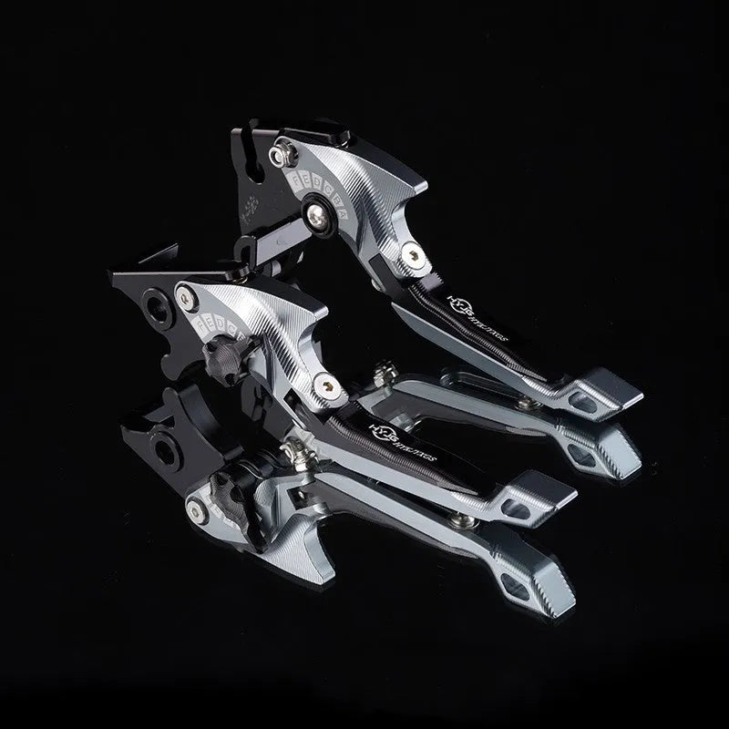 Pair of anodised aluminium motorcycle brake and clutch levers with six-speed adjustable length mechanism