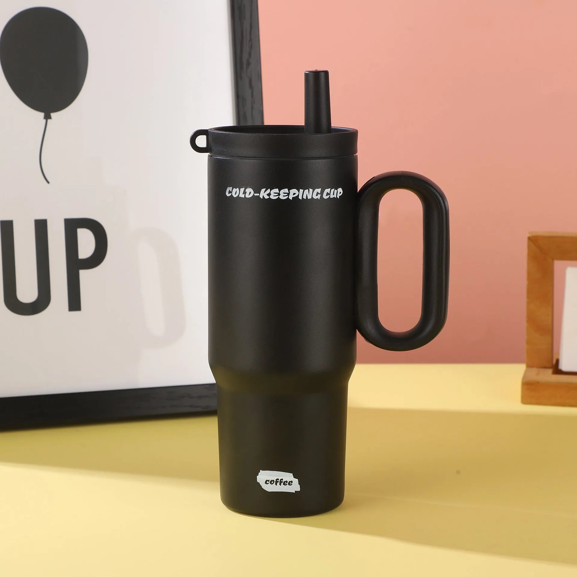 Large 700ml straw cup with a carry handle in assorted colours.