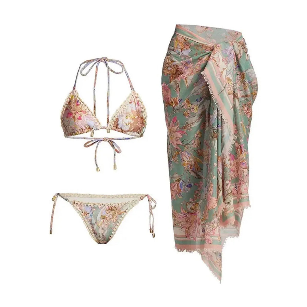 Women's floral print bikini set with top, briefs, and removable skirt in creamy-white colour