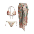 Women's floral print bikini set with top, briefs, and removable skirt in creamy-white colour