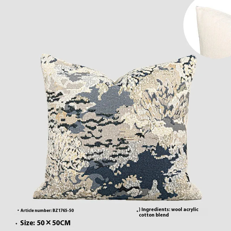 Antique blue floral patterned cushion cover in wool blend fabric, shown in square and rectangular sizes.