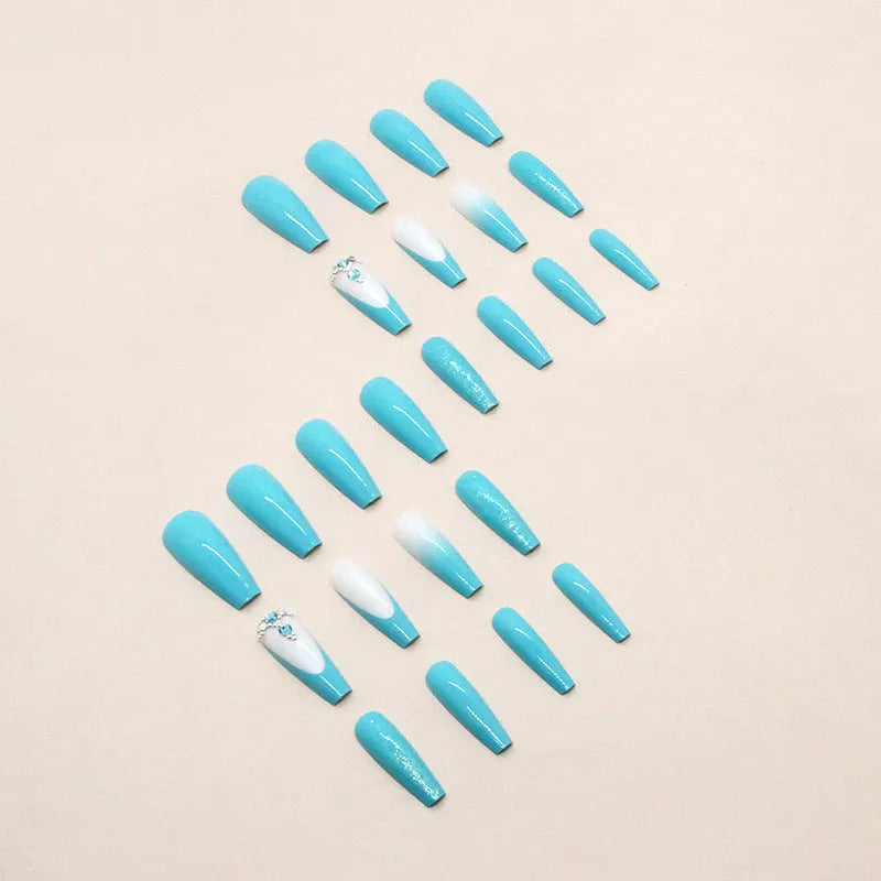 Solid colour long ballet false nails with blue diamond glitter and adhesive glue