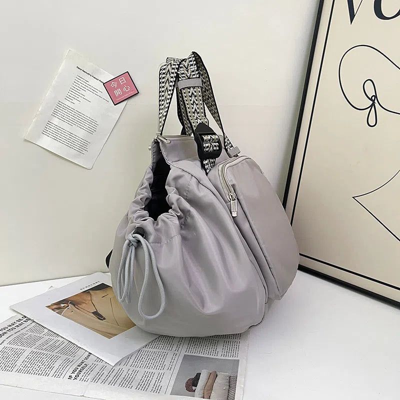 Nylon mommy bag in large capacity tote style, available in multiple colours for travel and daily use