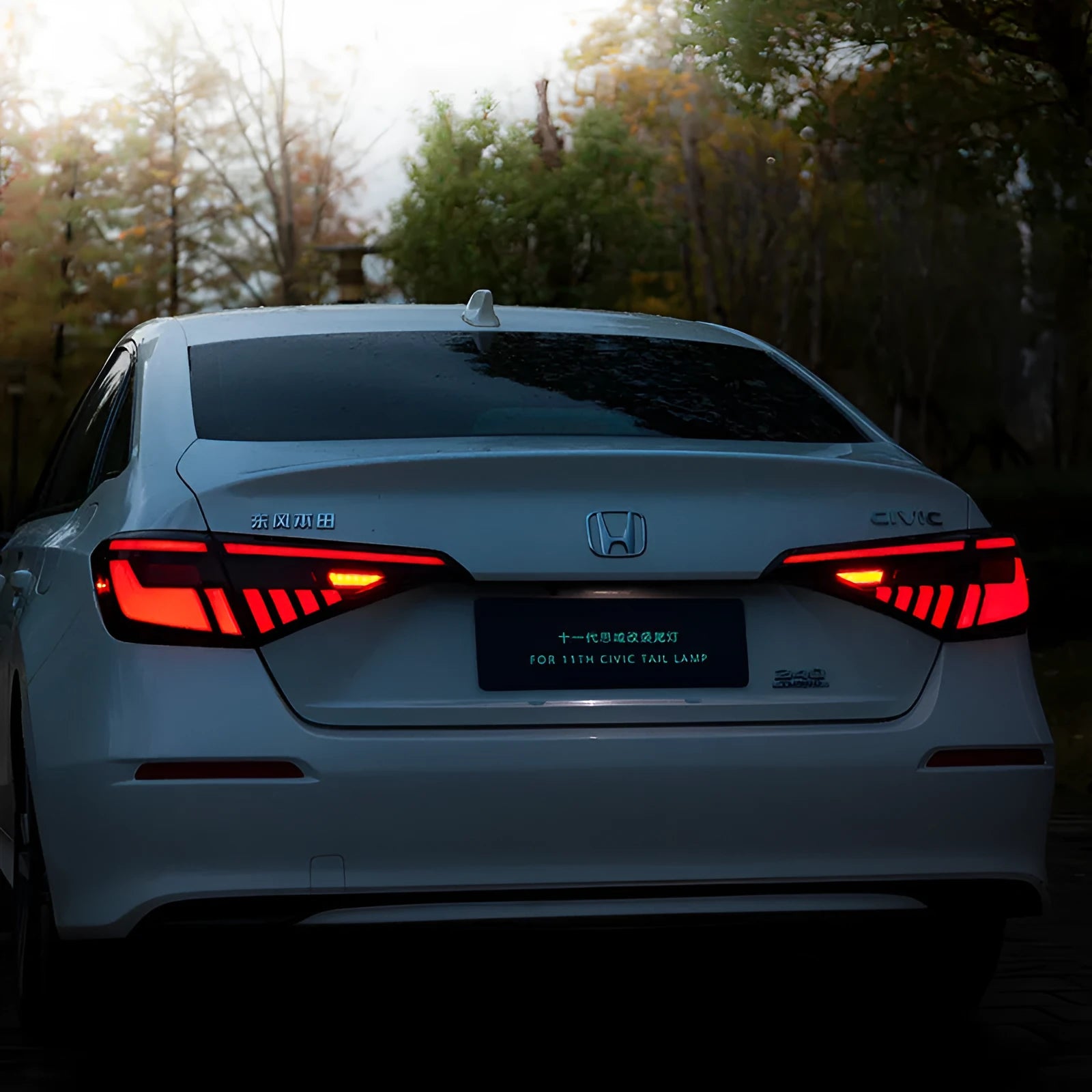 11th Generation Honda Civic modified LED taillight assembly in black and red or black and white