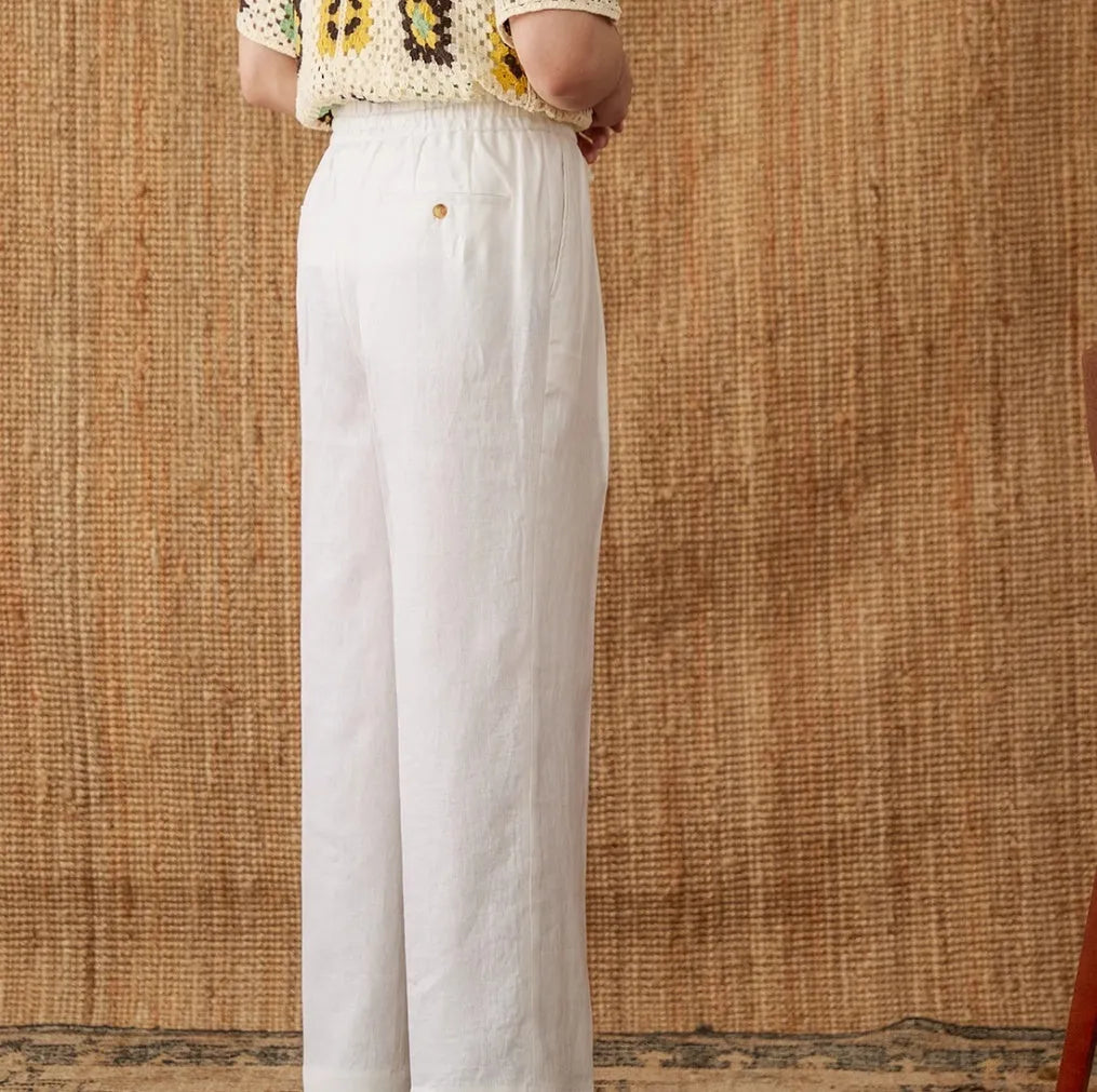 Women's linen trousers with elasticated high waistband in loose straight-leg cut