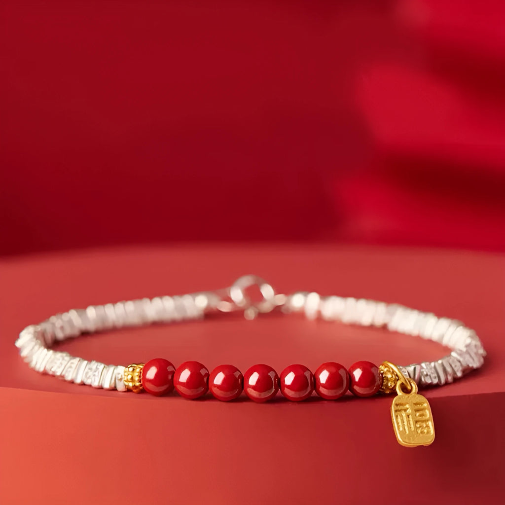 Silver electroplated copper lucky beads bracelet with geometric round beads on wrist